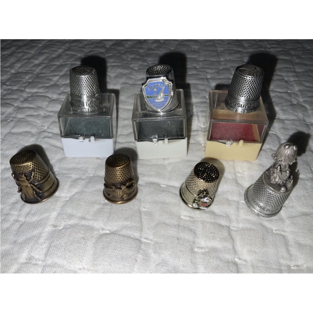 Lot Of 7 Vintage Metal & Brass Tone Thimbles And Butterfly Thimble Holder